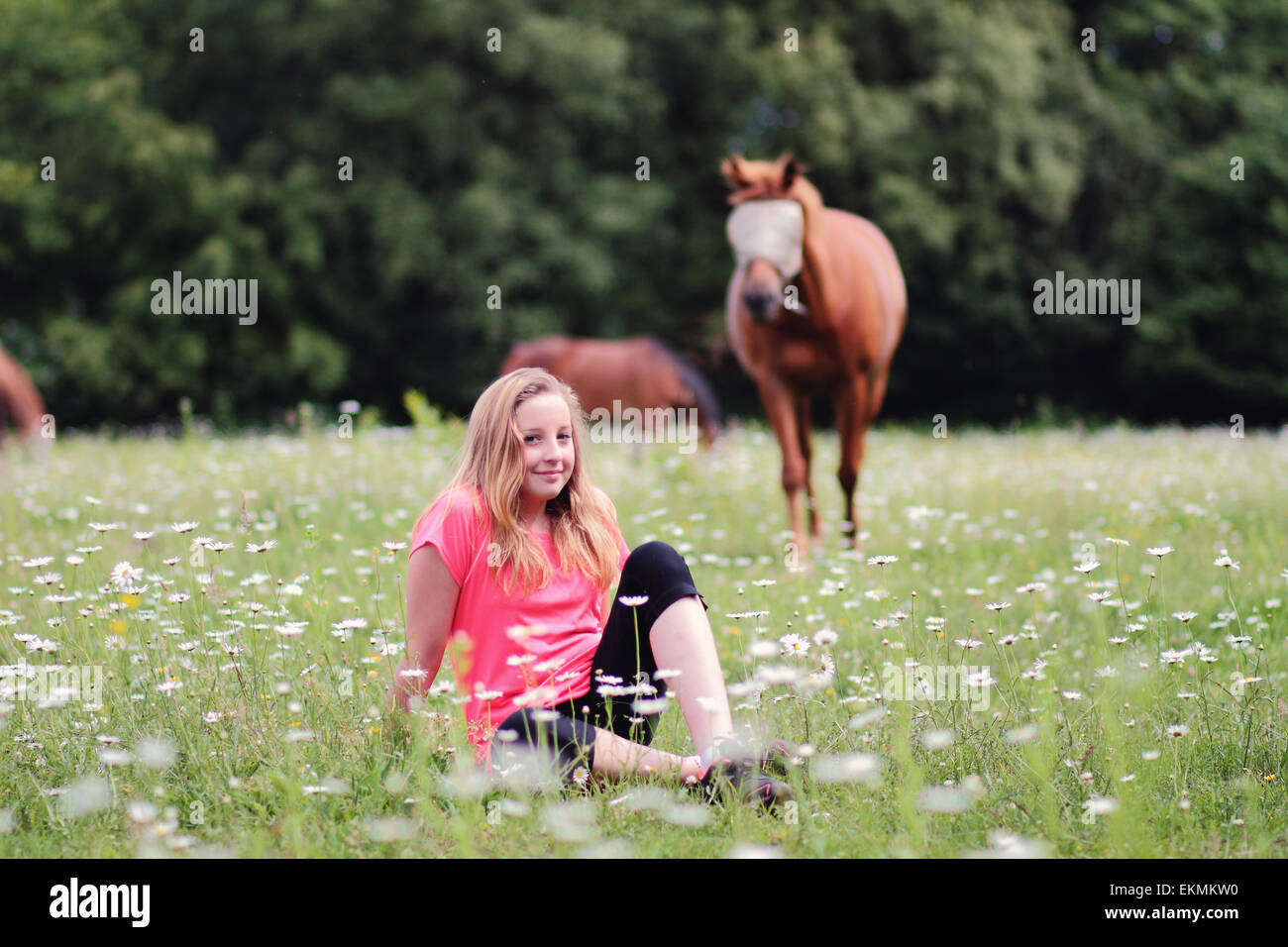 Young Girl in a Field Stock Photo - Alamy