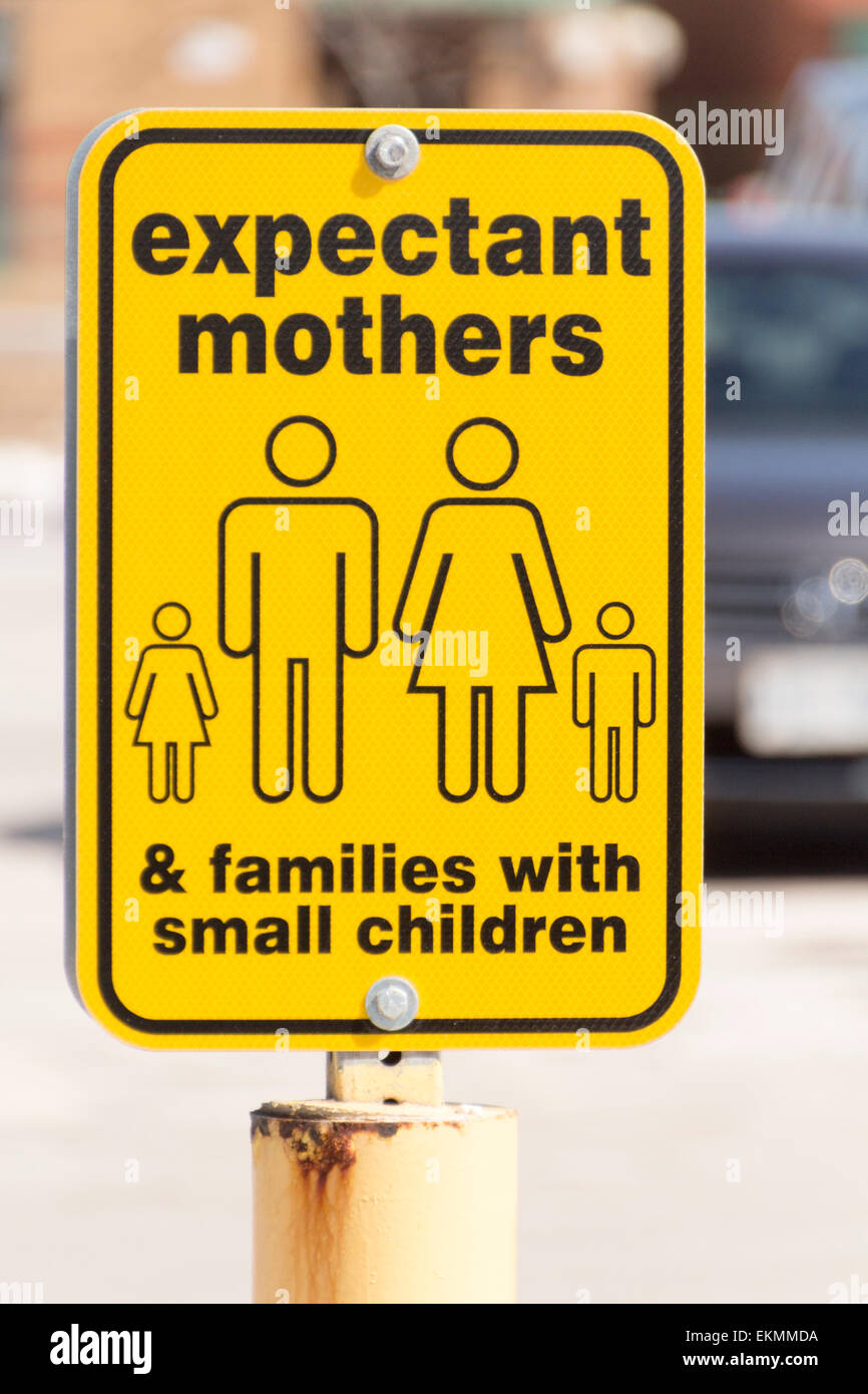 Parking sign for expectant mothers and families with small children Stock Photo