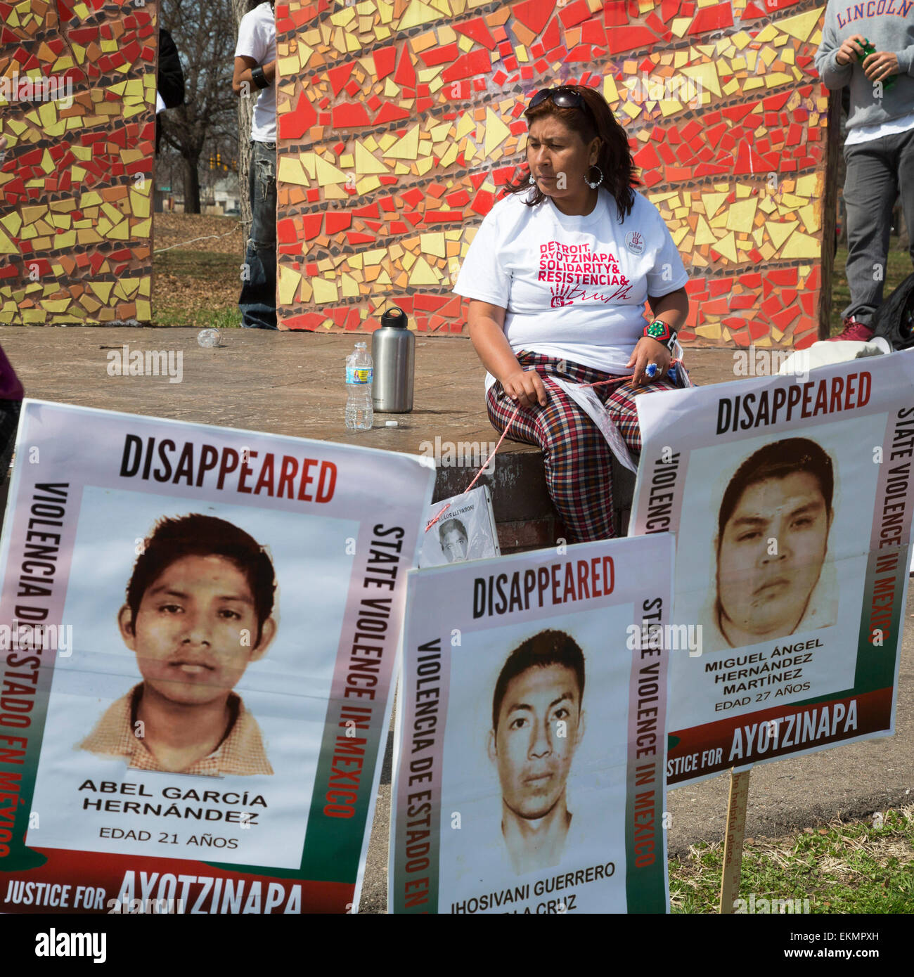 Detroit, Michigan, USA. 12th April, 2015. Maria de Jesus Tlatempa waits to speak at a rally protesting the September 2014 disappearance of 43 teachers college students in the southern Mexican state of Guerrero. The students from Ayotzinapa Teacher Training College were apparently arrested by local police who handed them over to a drug gang. Whe is the mother of disappeared student José Eduardo Bartolo Tlatempa. Relatives of the disappeared are traveling to cities across the U.S. to tell their story. Credit:  Jim West/Alamy Live News Stock Photo