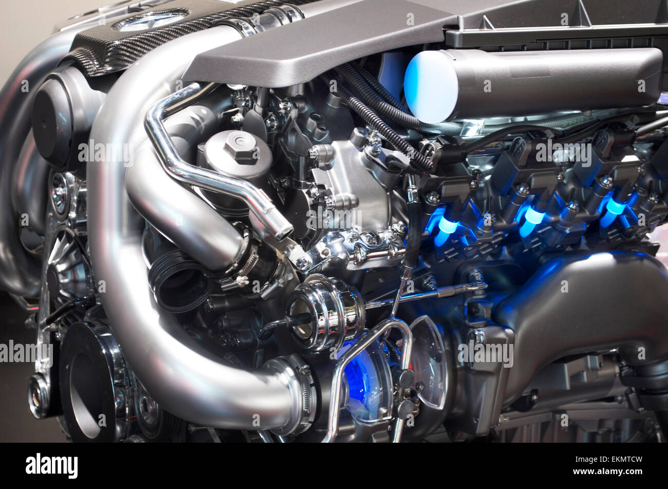 Clean automotive motor with blue lights, displayed at the Detroit International Auto Show. Stock Photo