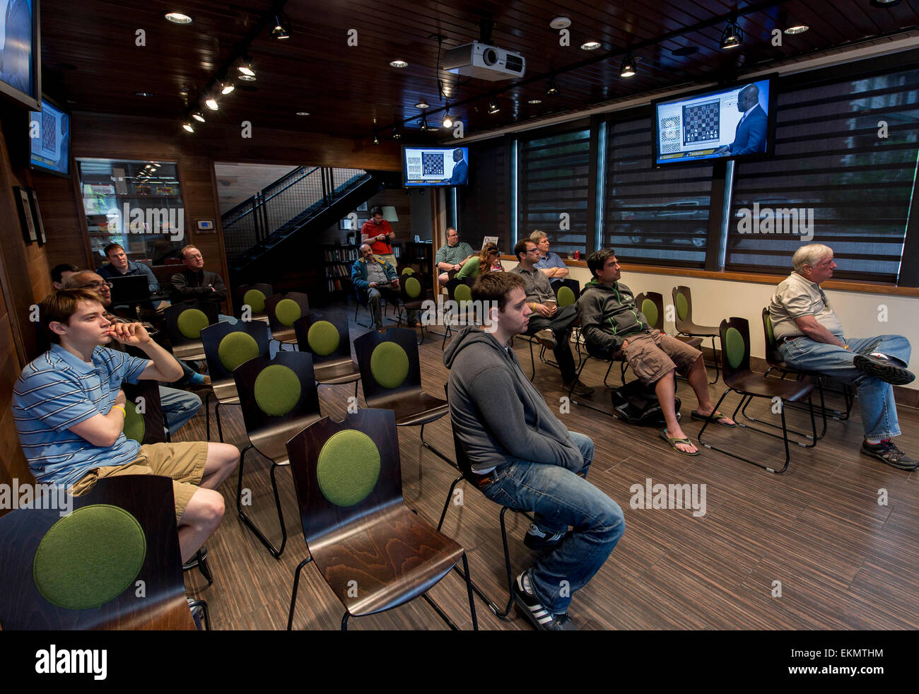 St. Louis, Missouri, USA. 12th Apr, 2015. Spectators watch a live streaming video feed of the action at the 2015 U.S. Chess Championships. Hosted by the Chess Club and Scholastic Center of St. Louis, the men's and women's championships were won this year by GM Hikaru Nakamura, the number three rated player in the world, and by Irina Krush, now a seven-time winner of the women's championship. Credit:  Brian Cahn/ZUMA Wire/Alamy Live News Stock Photo