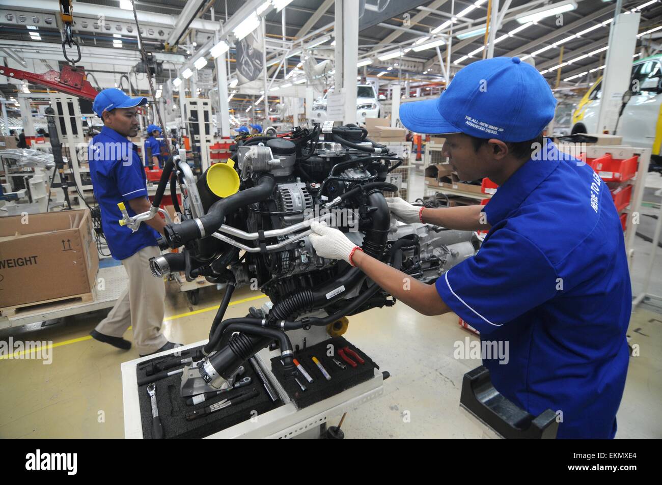 Jakarta, Indonesia. 10th Apr, 2015. JAKARTA, INDONESIA - APRIL 13 : Workers assemble the third generation of BMW X5 Advance Diesel automobile on the production line at the Bayerische Motoren Werke (BMW) factory on April 10, 2015 in Jakarta, Indonesia. © Sijori Images/ZUMA Wire/Alamy Live News Stock Photo