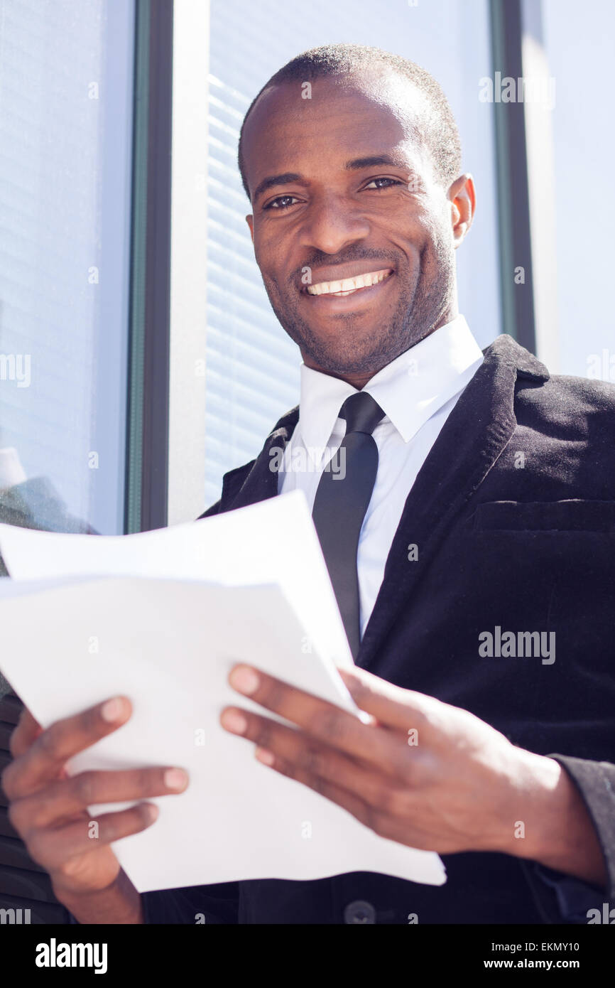 happy black businessman documents handling Stock Photo
