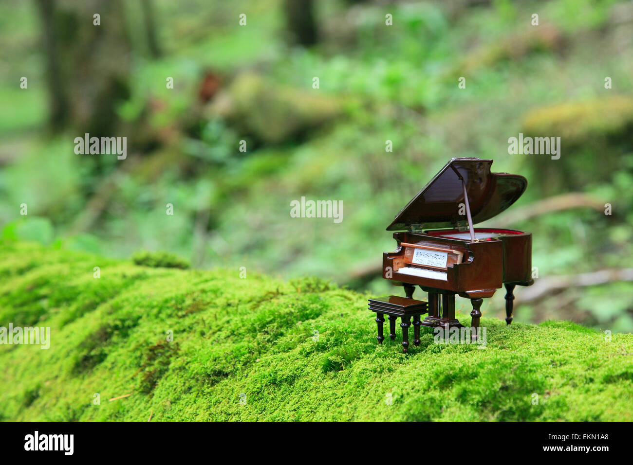 Miniature piano in nature Stock Photo - Alamy
