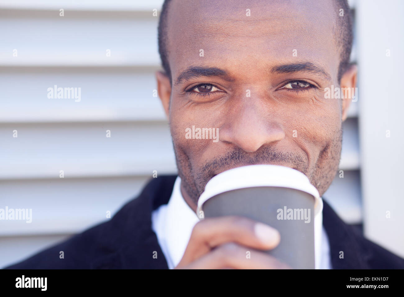 trendy black man have coffee break outdoors Stock Photo