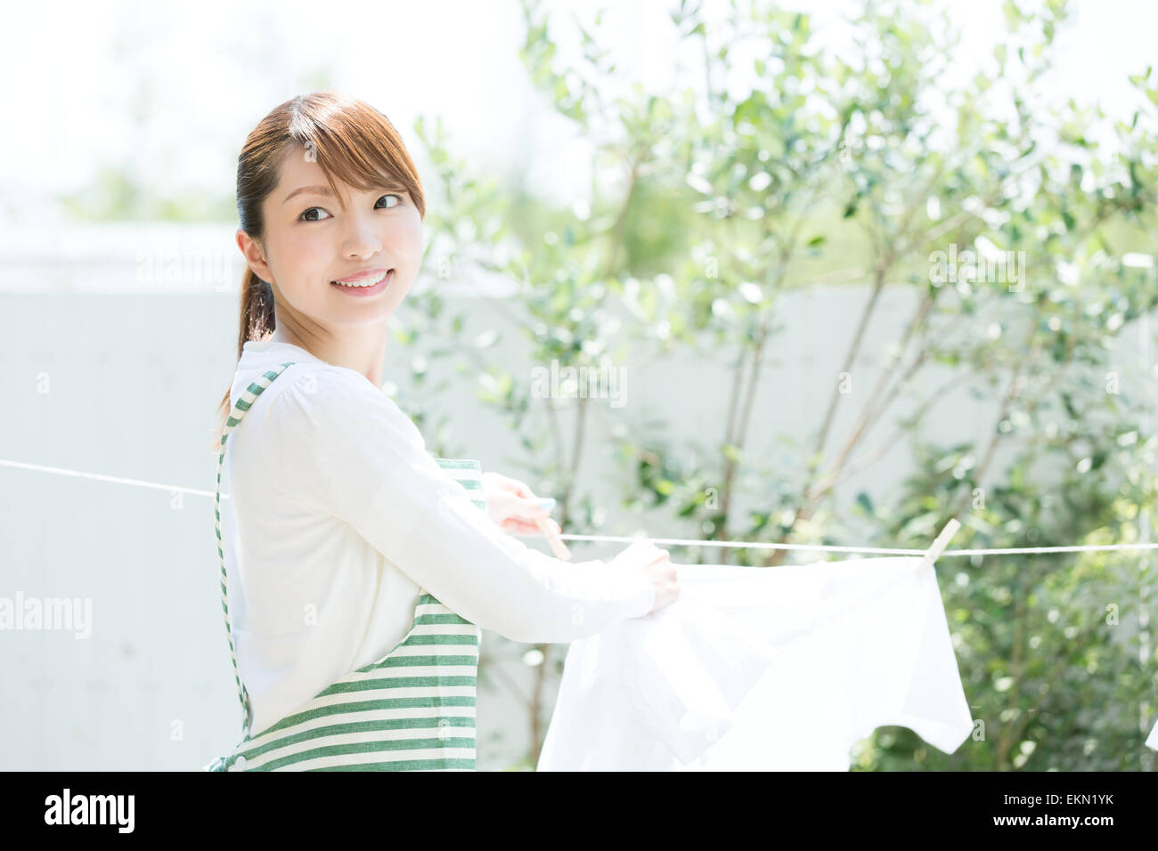 Attractive young housewife Stock Photo
