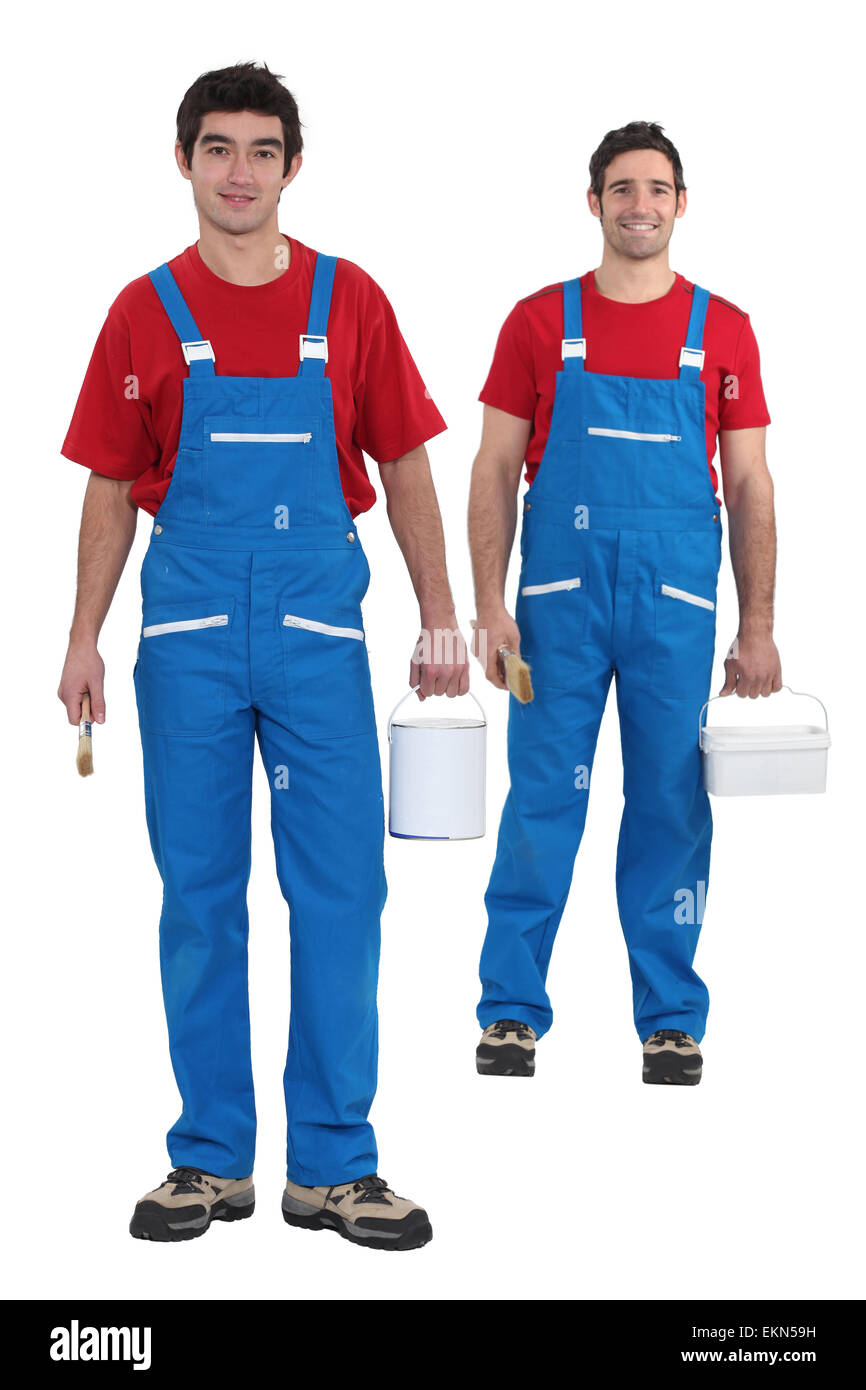 Painters with blue overalls and redshirt Stock Photo Alamy