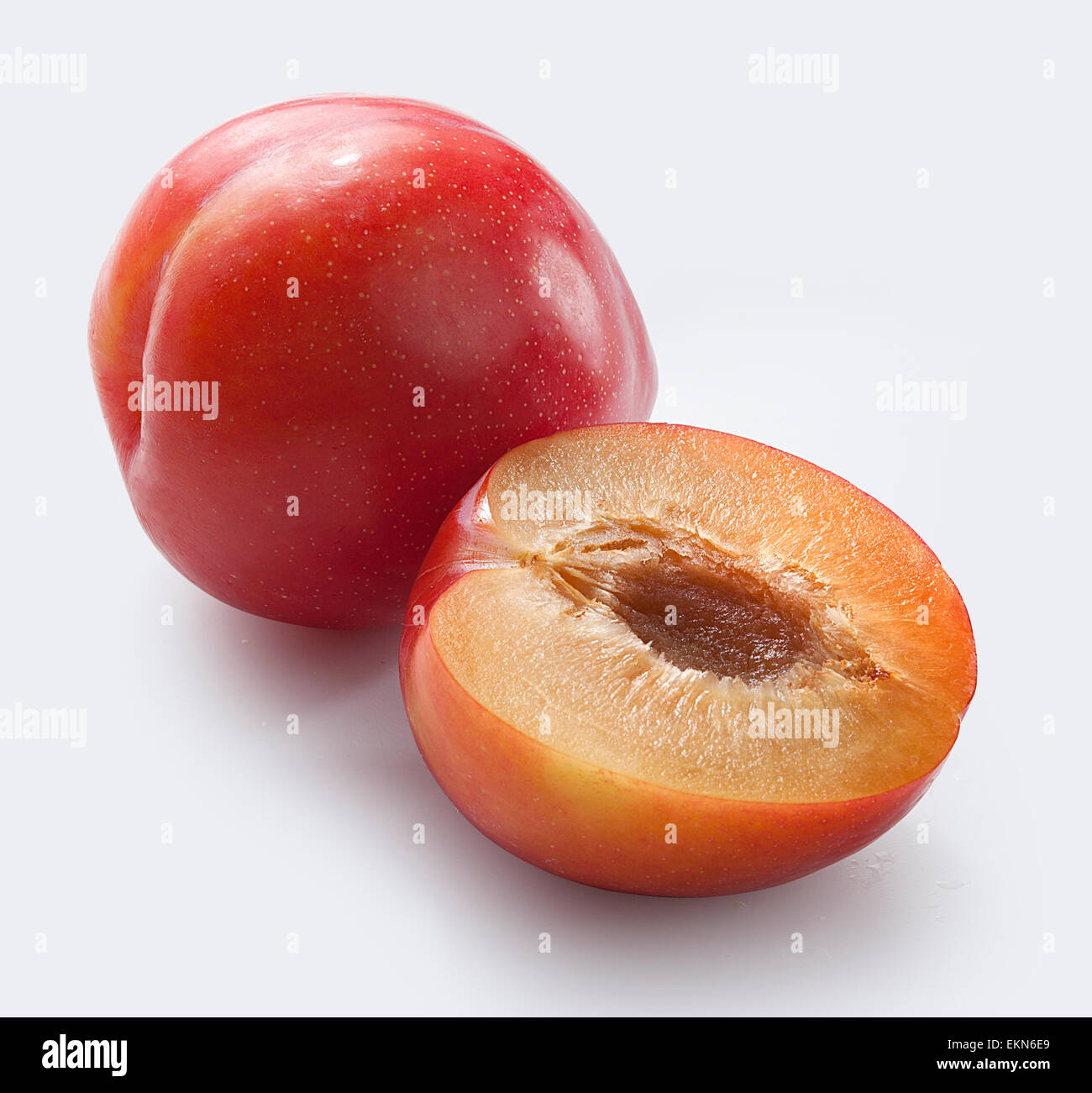 Isolated plums whole half hi-res stock photography and images - Alamy