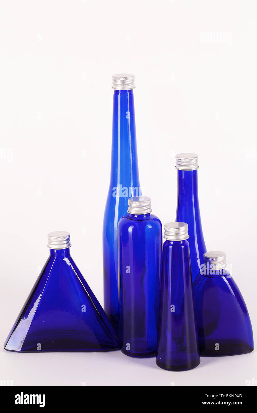 Little blue bottles isolated Stock Photo Alamy