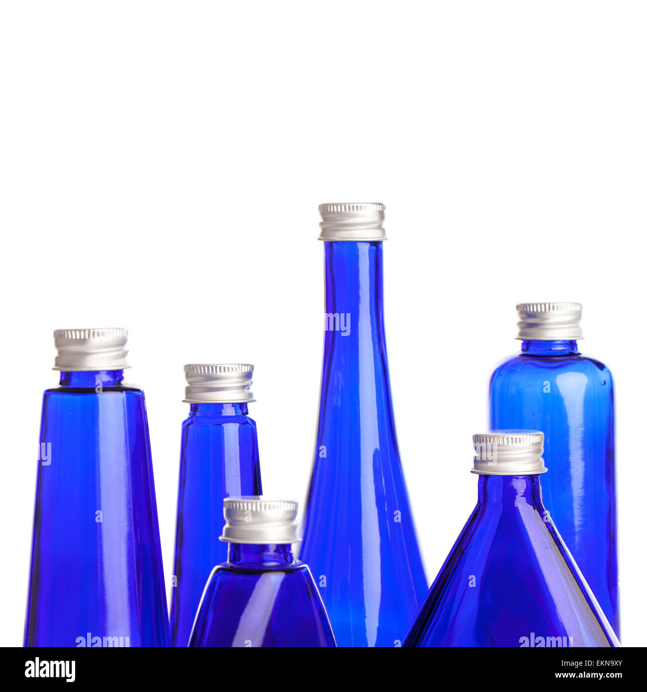 Little blue bottles isolated Stock Photo Alamy