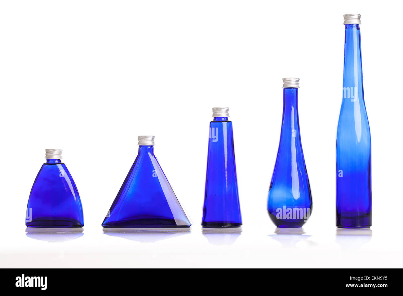 Little blue bottles isolated Stock Photo Alamy