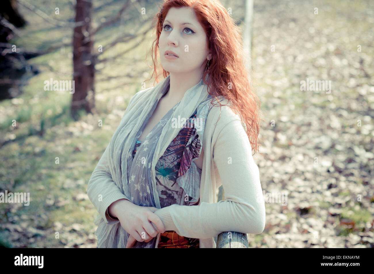 beautiful young woman posing in the park Stock Photo - Alamy