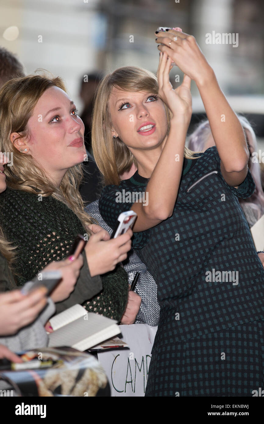 Taylor Swift is greeted by fans outside the BBC Radio 1 studios  Featuring: Taylor Swift Where: London, United Kingdom When: 09 Oct 2014 Stock Photo