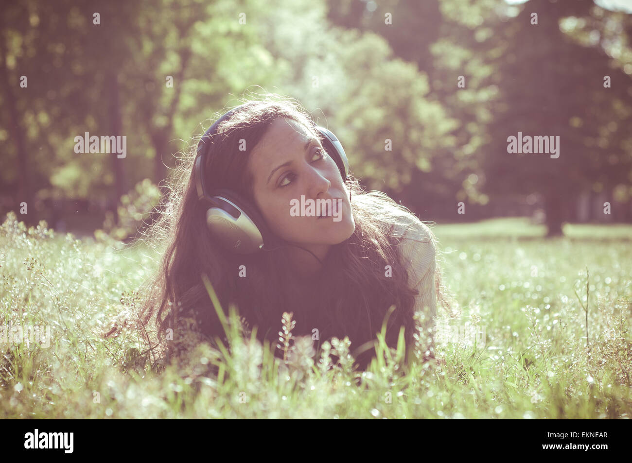 vintage hipster eastern woman with headphones Stock Photo
