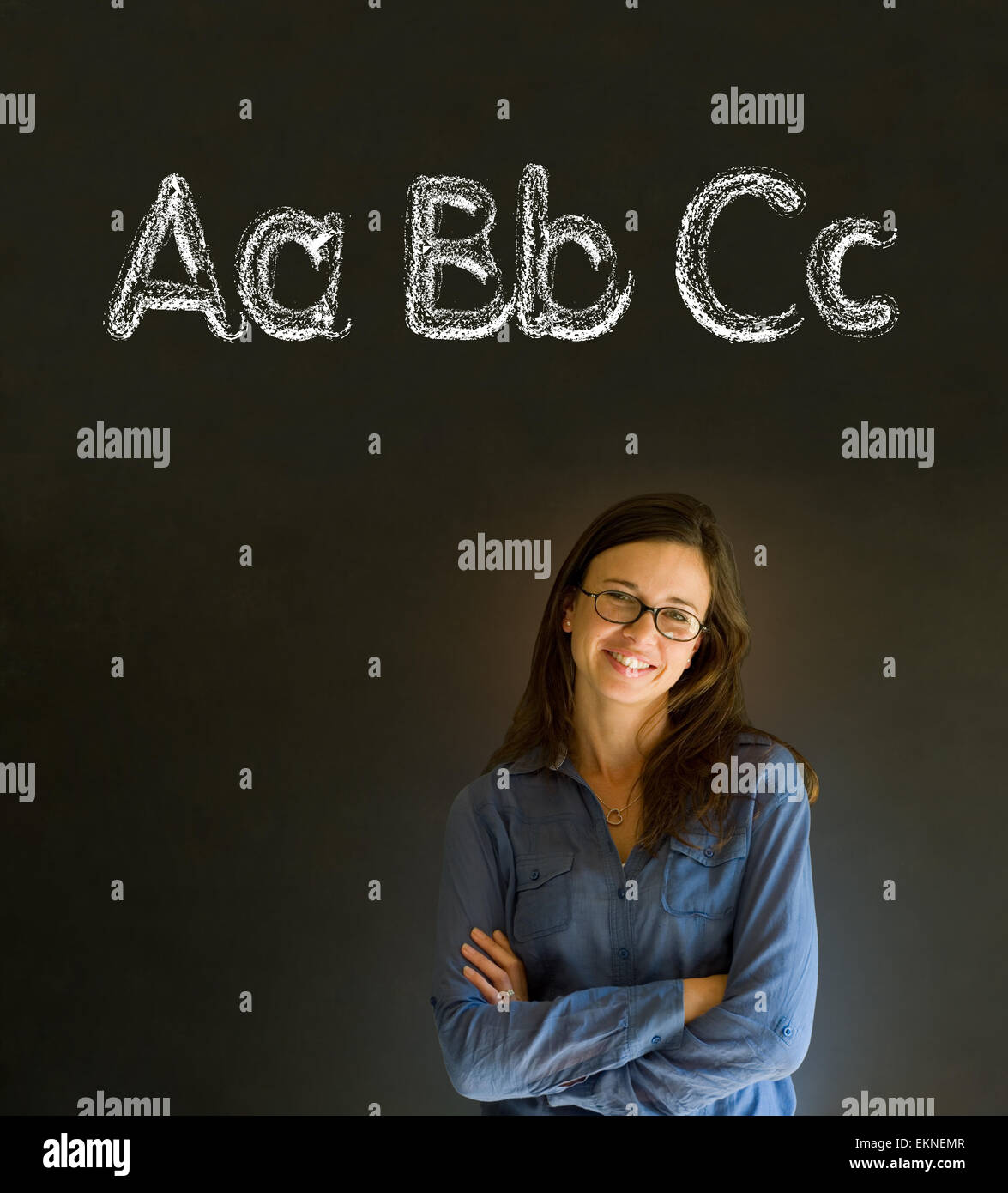 Learn alphabet write writing teacher Stock Photo - Alamy