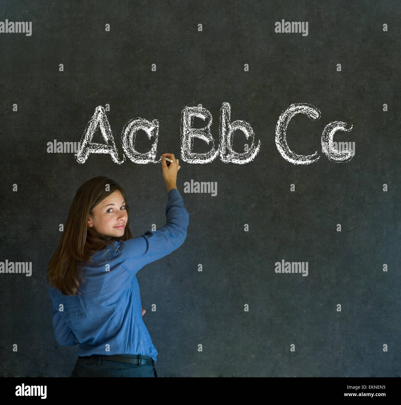 Learn alphabet write writing teacher Stock Photo - Alamy