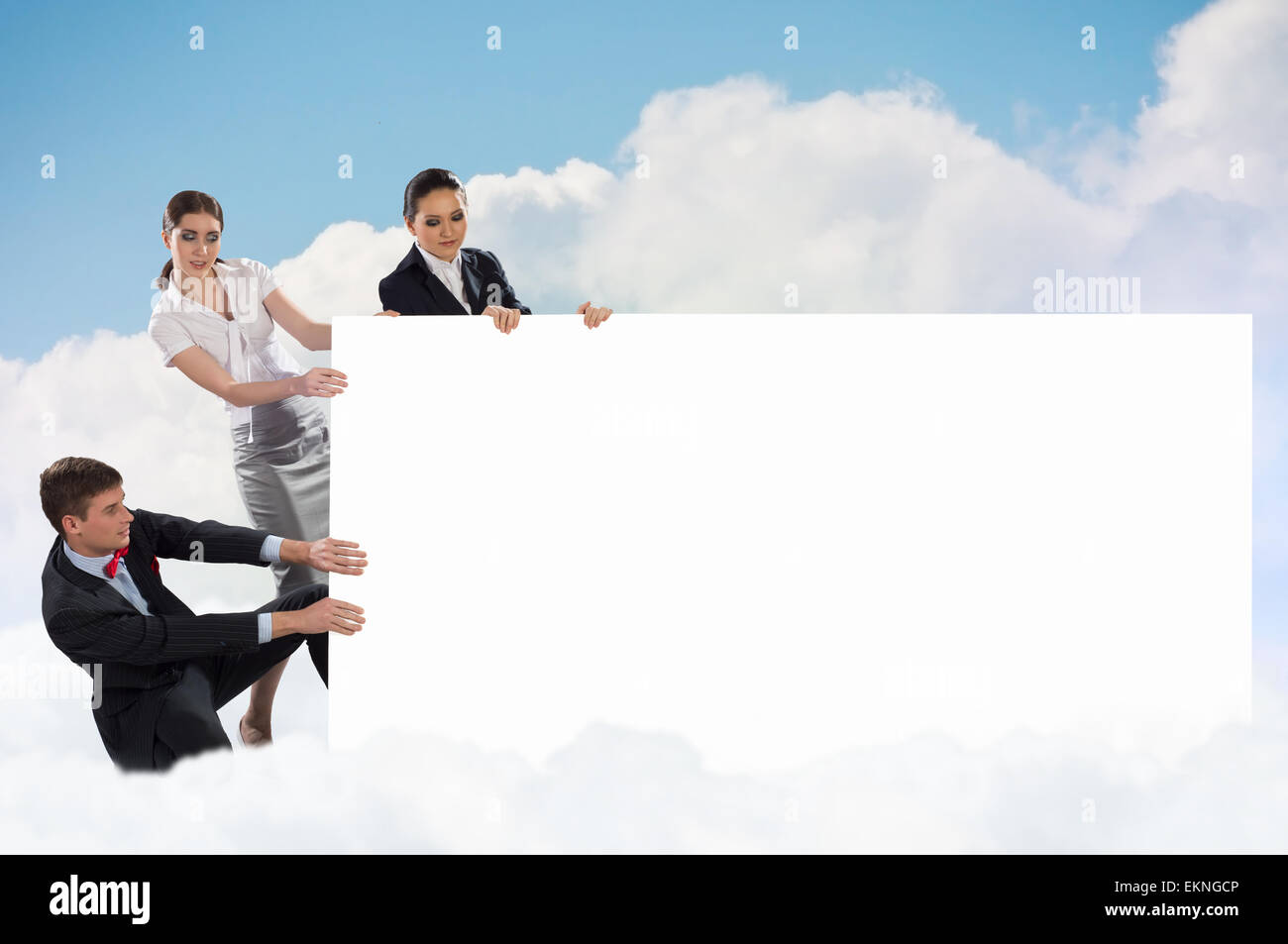 small group of people holding a blank banner Stock Photo - Alamy