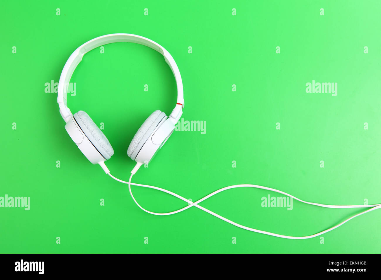 Headphone on green background Stock Photo Alamy