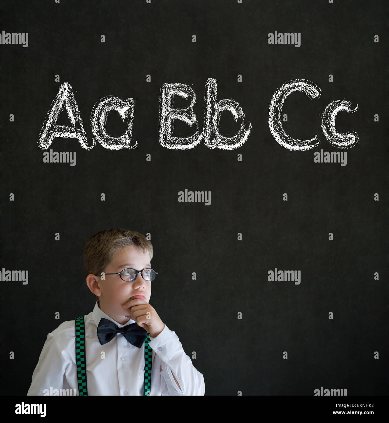 Thinking boy business man with learn English language alphabet Stock ...