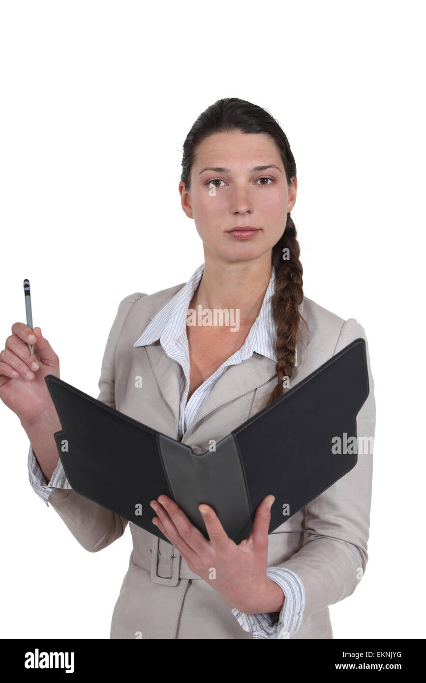 Secretary holding office supplies Stock Photo Alamy