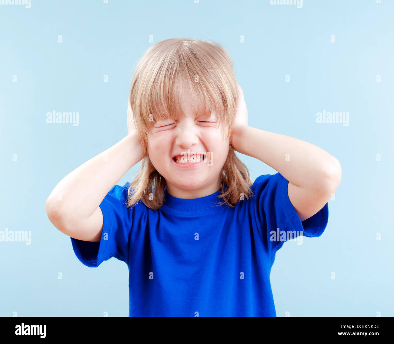 boy covering his ears Stock Photo Alamy