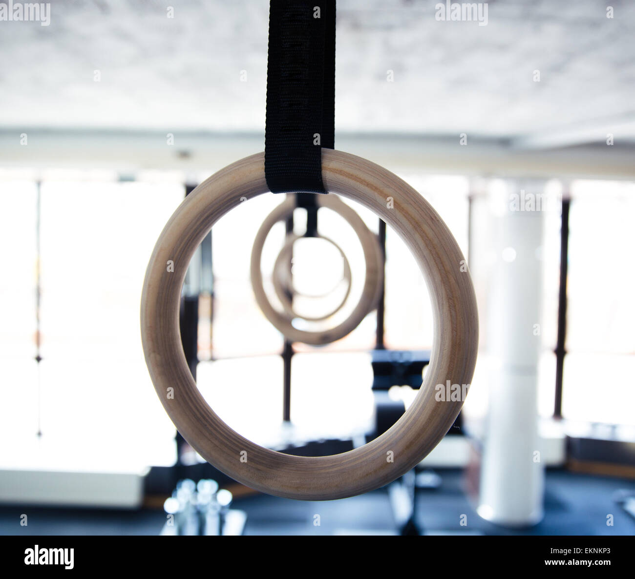 Gymnastic rings hanging at cross fitness gym Stock Photo Alamy