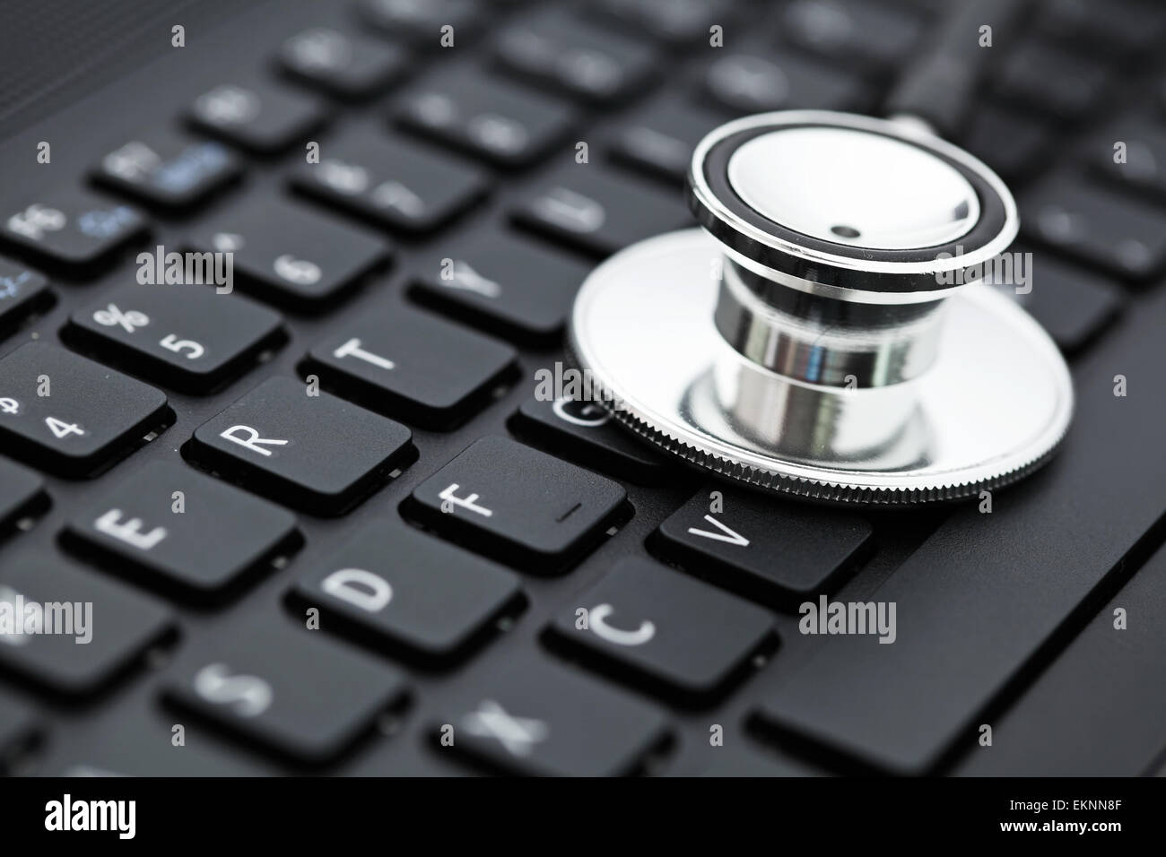 Stethoscope on keyboard Stock Photo - Alamy