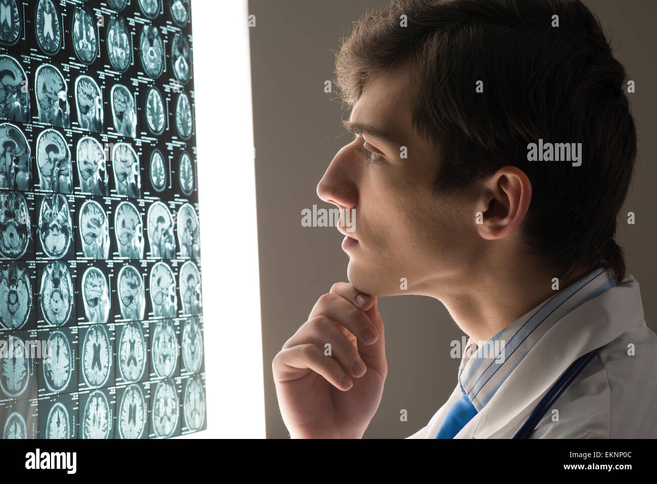 male doctor looking at the x-ray image Stock Photo