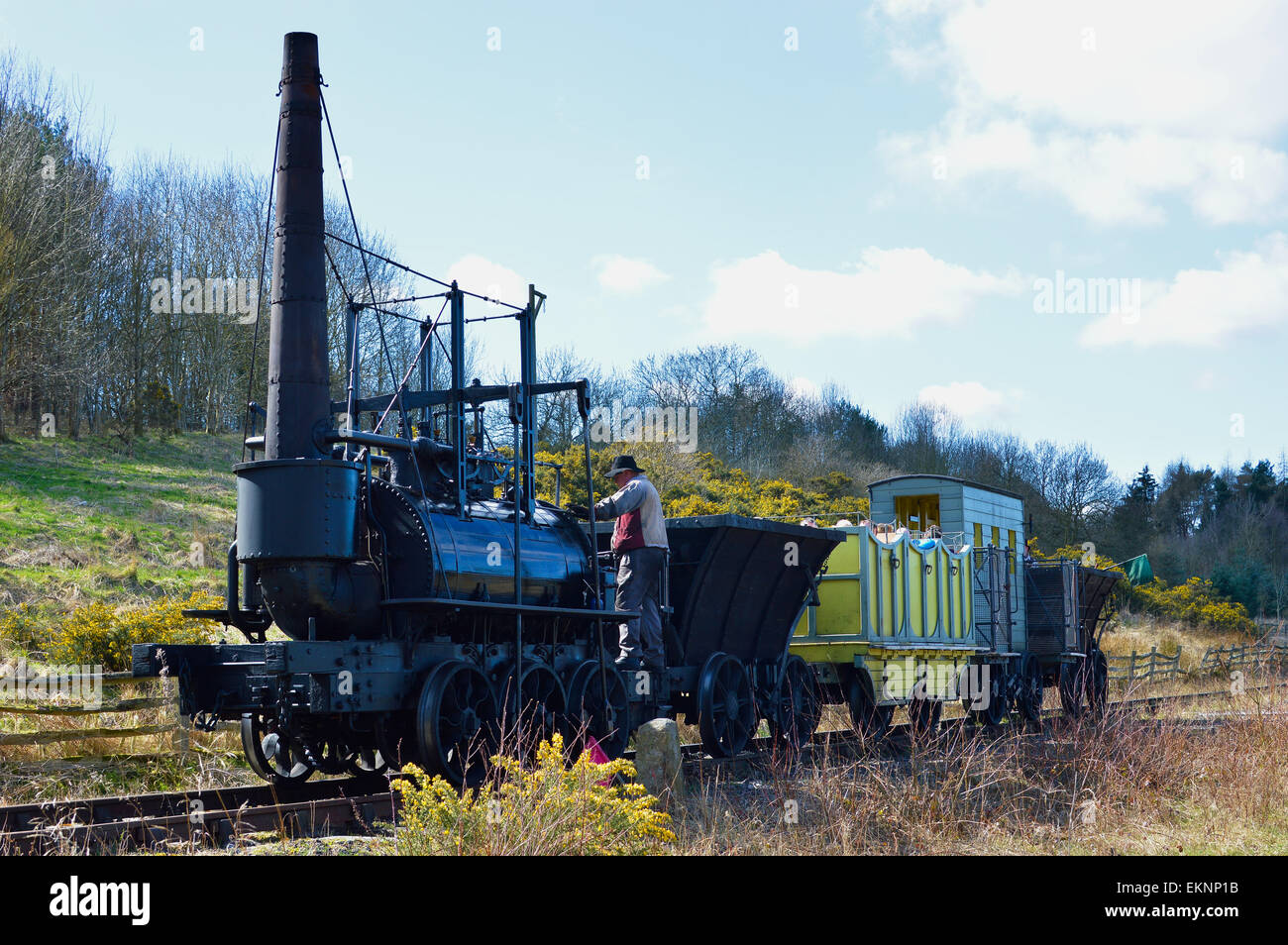 Visitors on a steam engine ride in Beamish Open Air Museum, County Durham. Replica of George Stephensons Locomotion No 1. Stock Photo