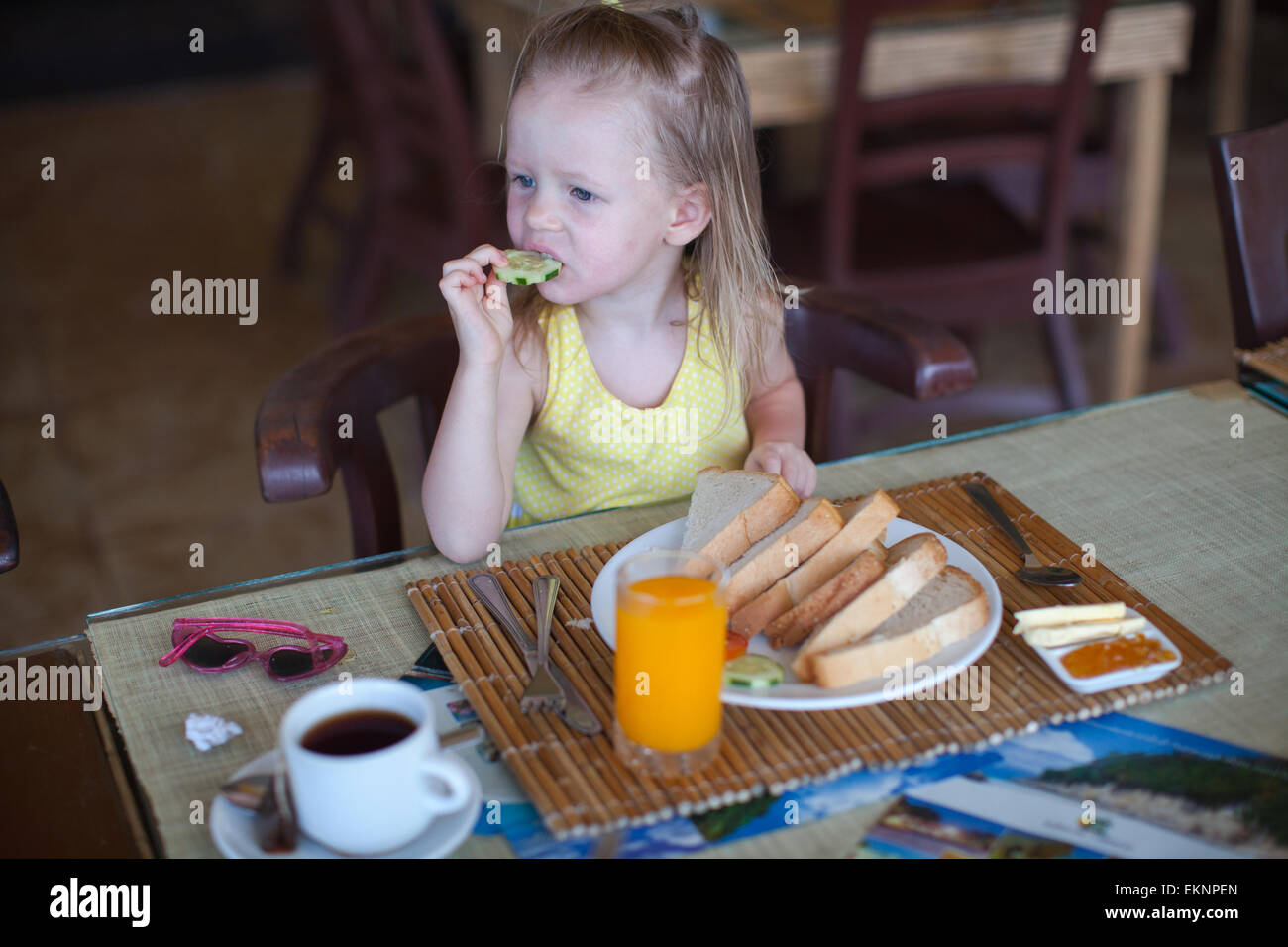 Breakfast Little Adorable little girl having breakfast at resort restaurant Stock Photo ...