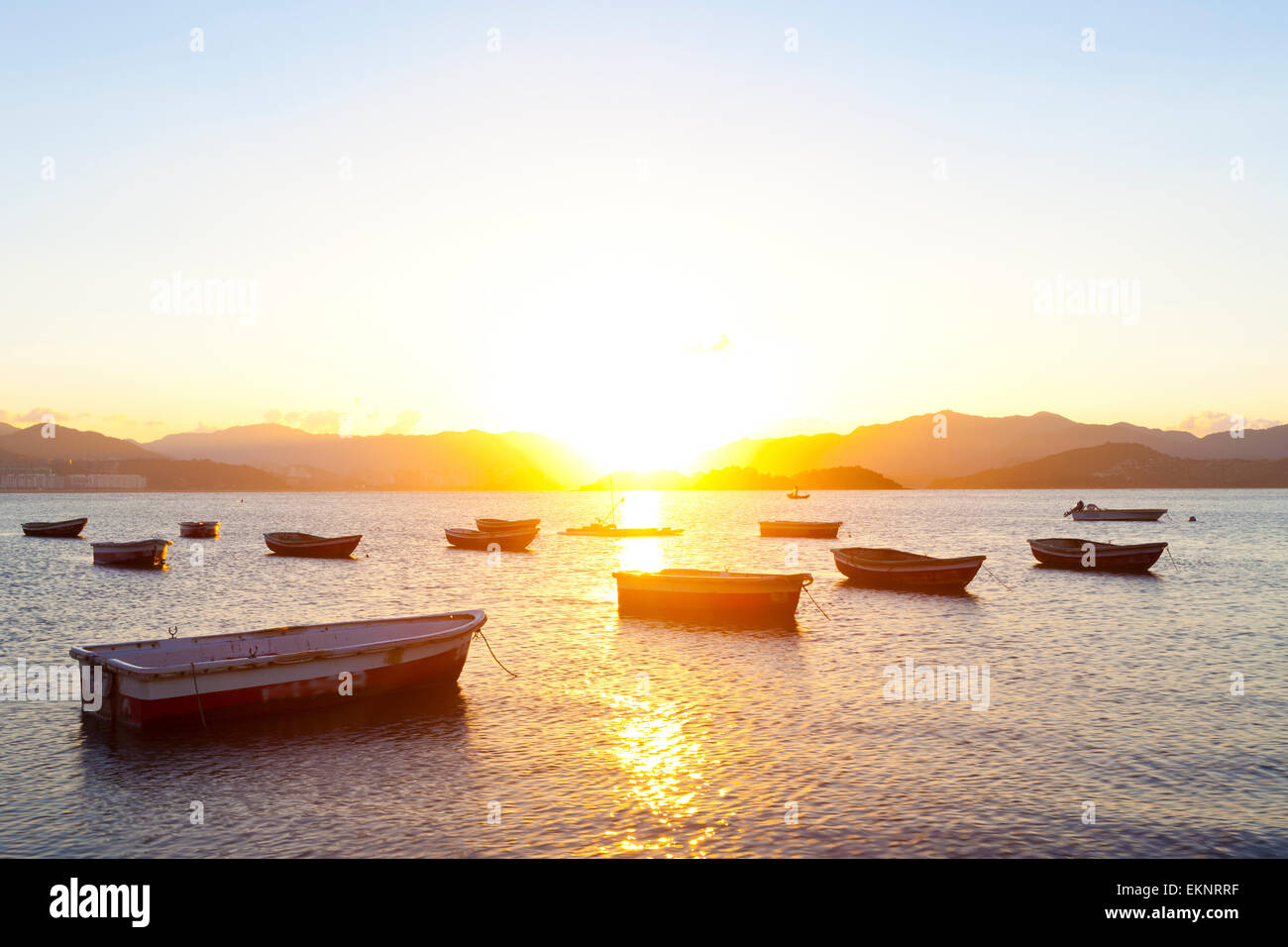 Beautiful sunset on beach boats hi-res stock photography and images - Alamy