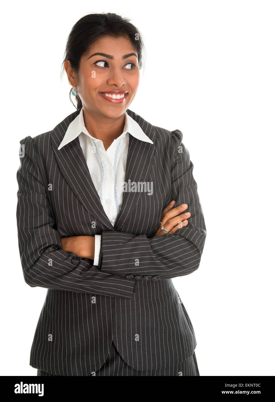 Indian businesswoman hands folded looking side Stock Photo - Alamy