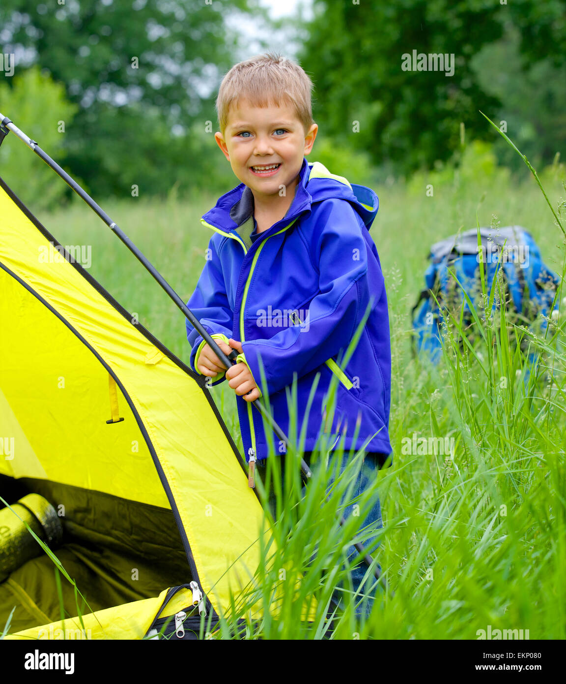 young boy camping with tent Stock Photo Alamy
