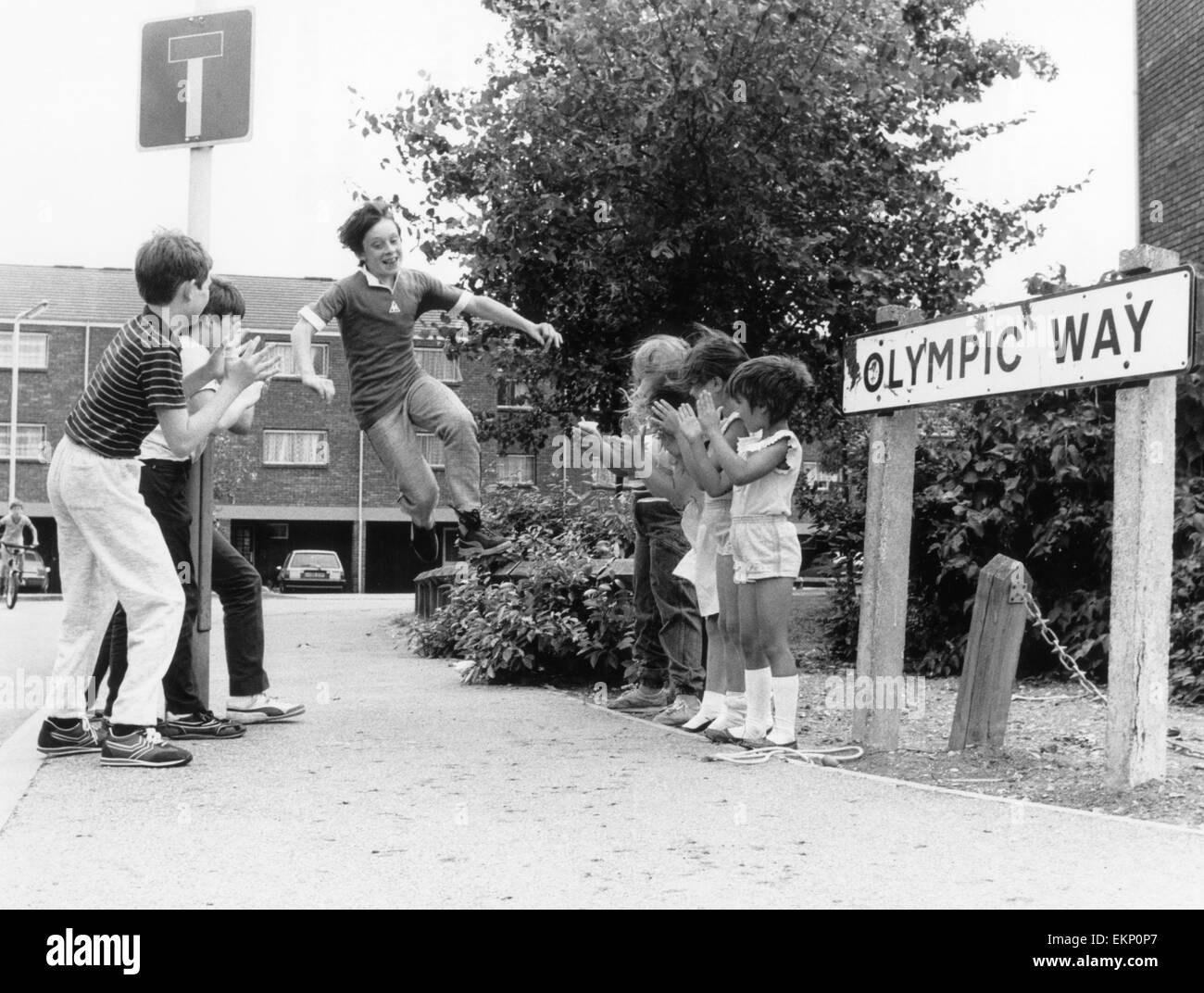 6000 miles from where the Los Angeles Olympics are being held, you can find a group of children contesting their very own 'Unofficial' Olympics in Olympic Way, Greenford, Middlesex 7th August 1984. Stock Photo