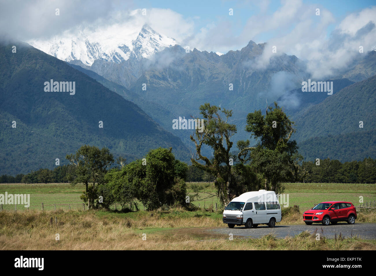 Motoring in the Fox Glacier Valley below Mount Cook, south island, New Zealand. Stock Photo