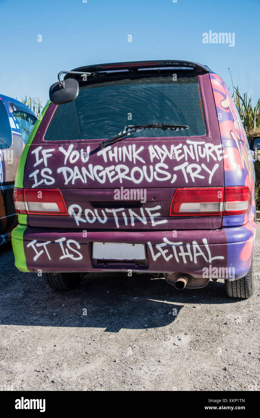 car graffiti on tourist people carrier in New Zealand. Stock Photo