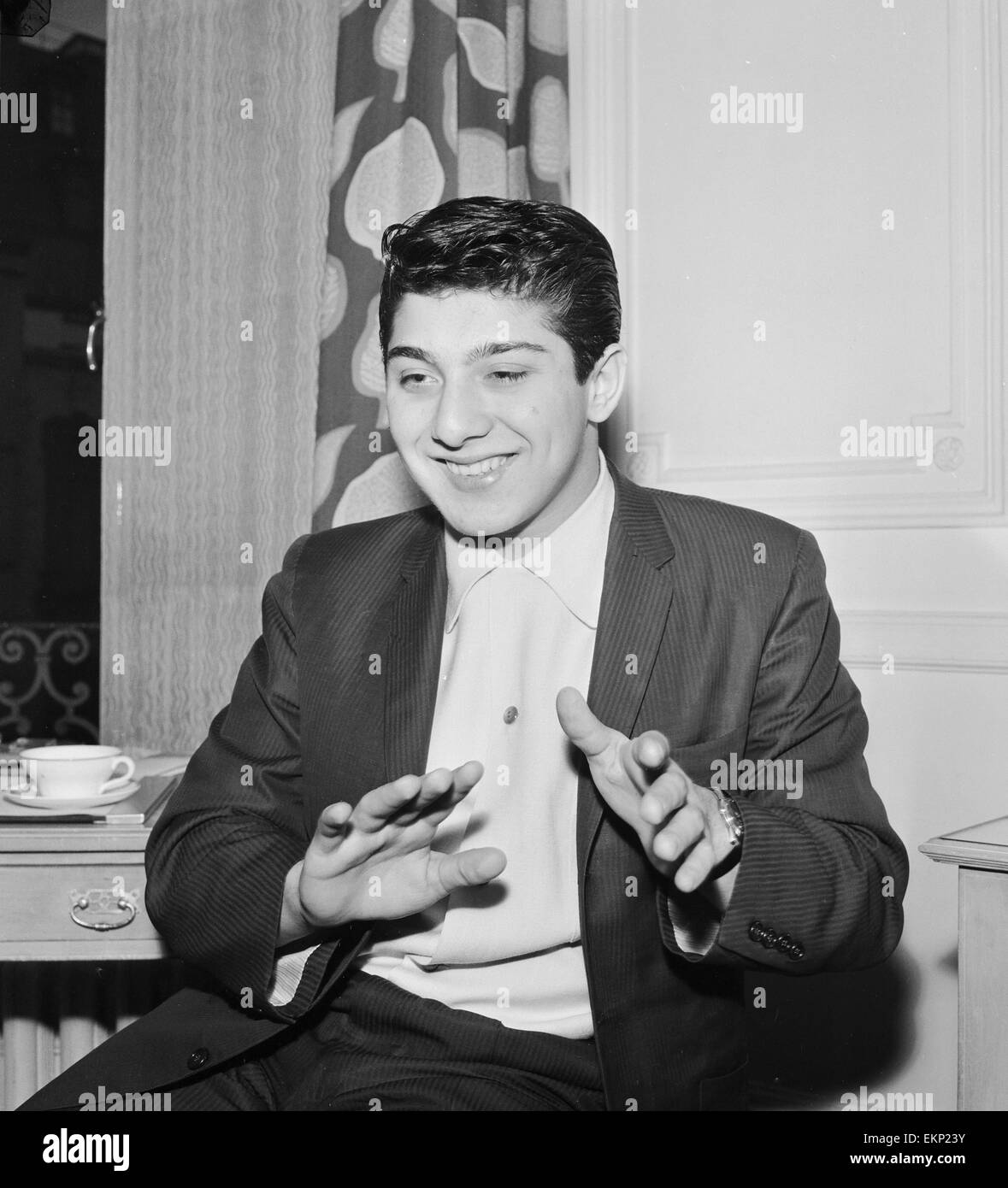 Canadian singer songwriter Paul Anka pictured in his suite at the Savoy Hotel in London during his visit to Britain. 20th January 1959. Stock Photo