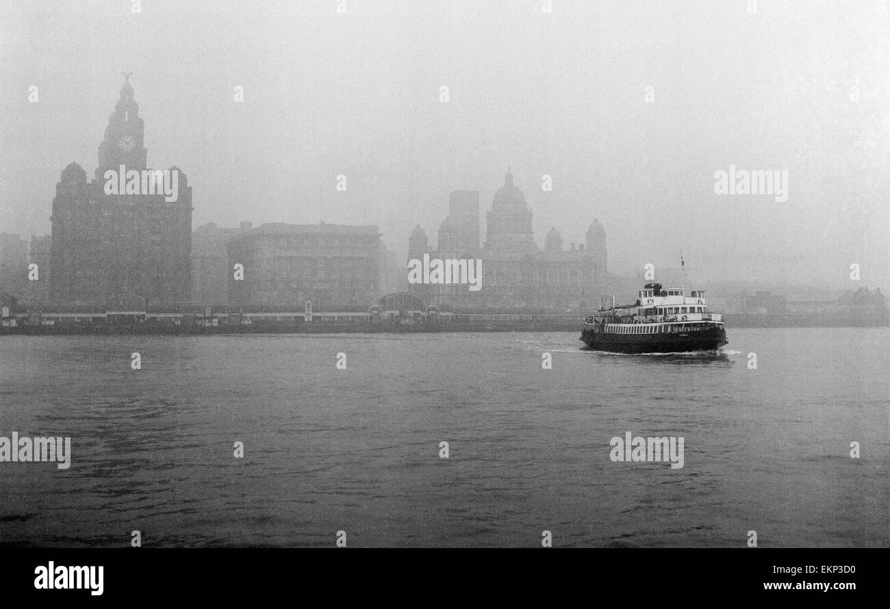 Unemployed and views of Liverpool, 30th November 1962. Docks and Harbour Board offices, the Royal Liver Building and the Cunard building with the Ferry 'Woodchurch' coming across the Mersey. Stock Photo