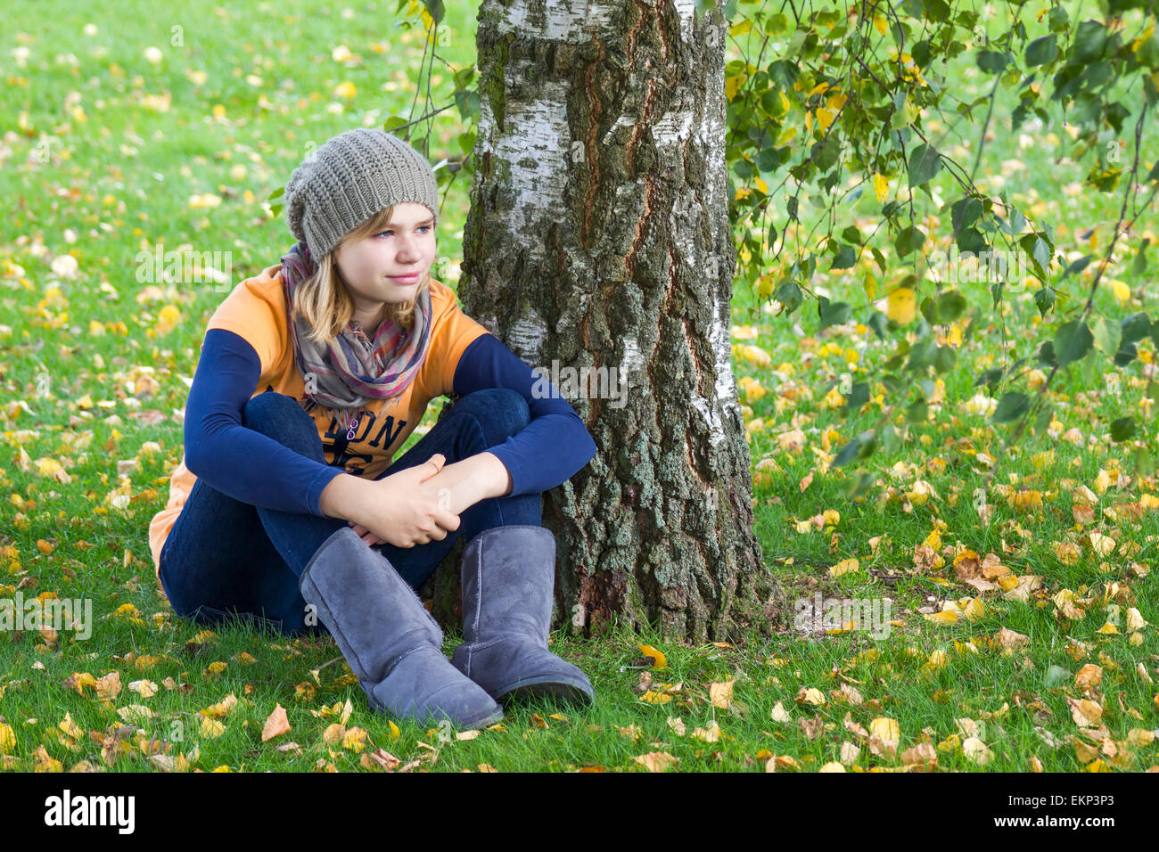 cute little girl in the autumn park Stock Photo - Alamy