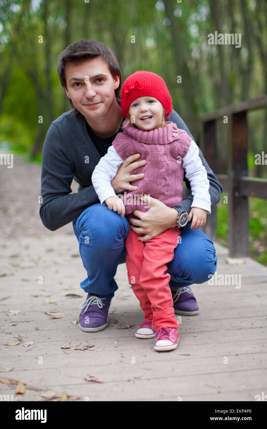 Portrait of happy father with daughter in the park in autumn Stock ...