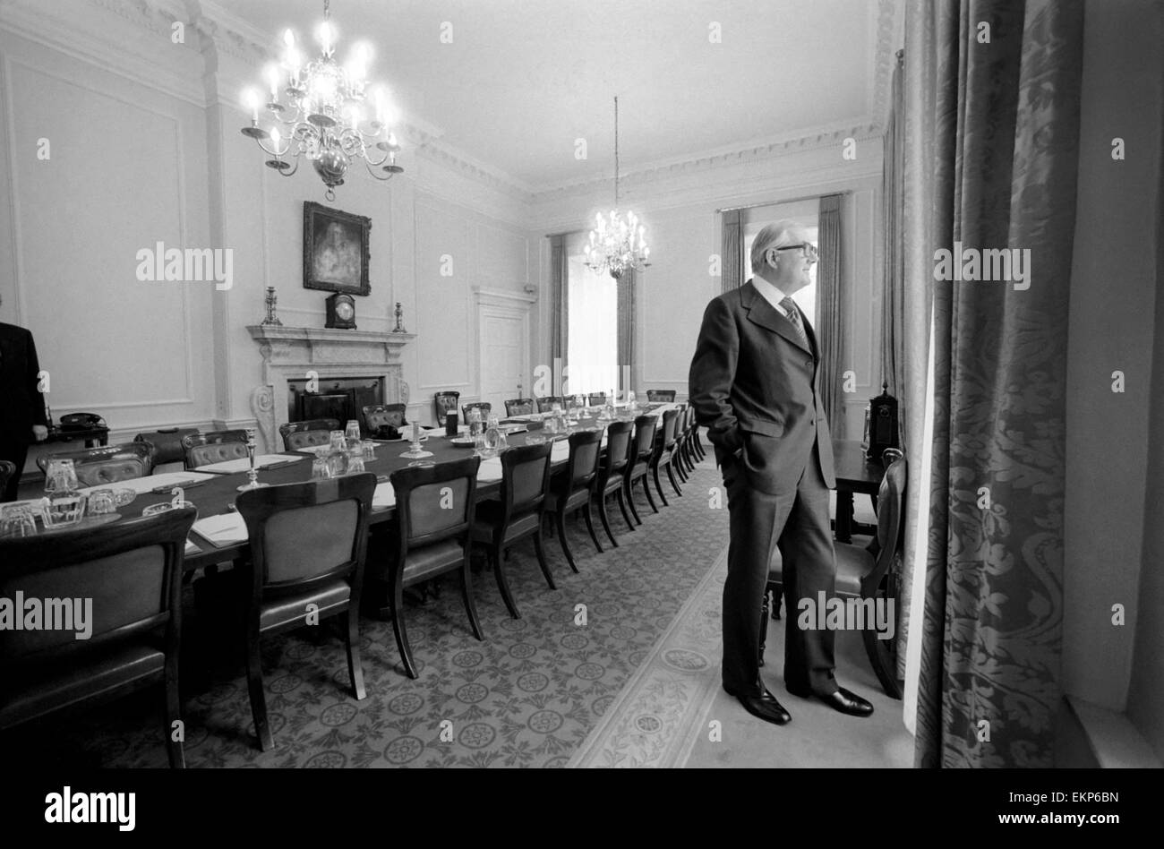 British Prime Minister James Callaghan at 10 Downing Street. The Prime Minister look out of the Cabinet Room window at the garden and Horse Guards. April 1978 78-1666-001 Stock Photo