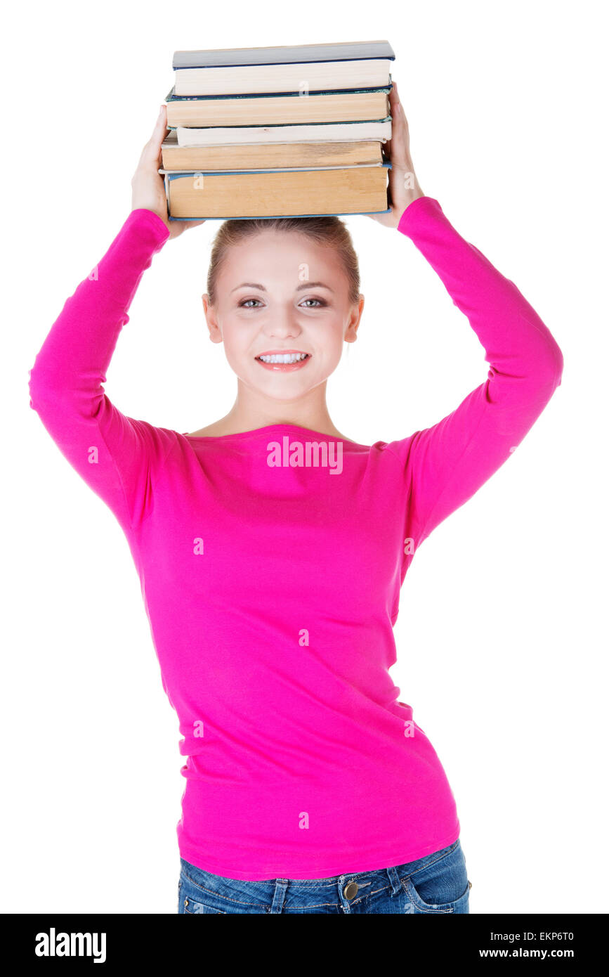 Woman (student) with bookd on her head Stock Photo