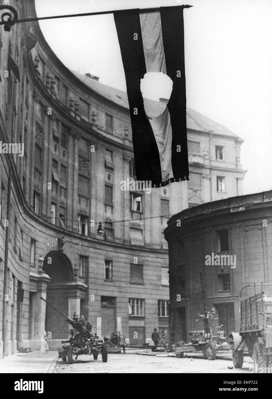The Hungarian flag seen here flying from a government building in Budapest with the red star cut out of it. By the end of October 1956 the fighting between the pro soviet communists and hastily organised militas had almost stopped. The new government form Stock Photo