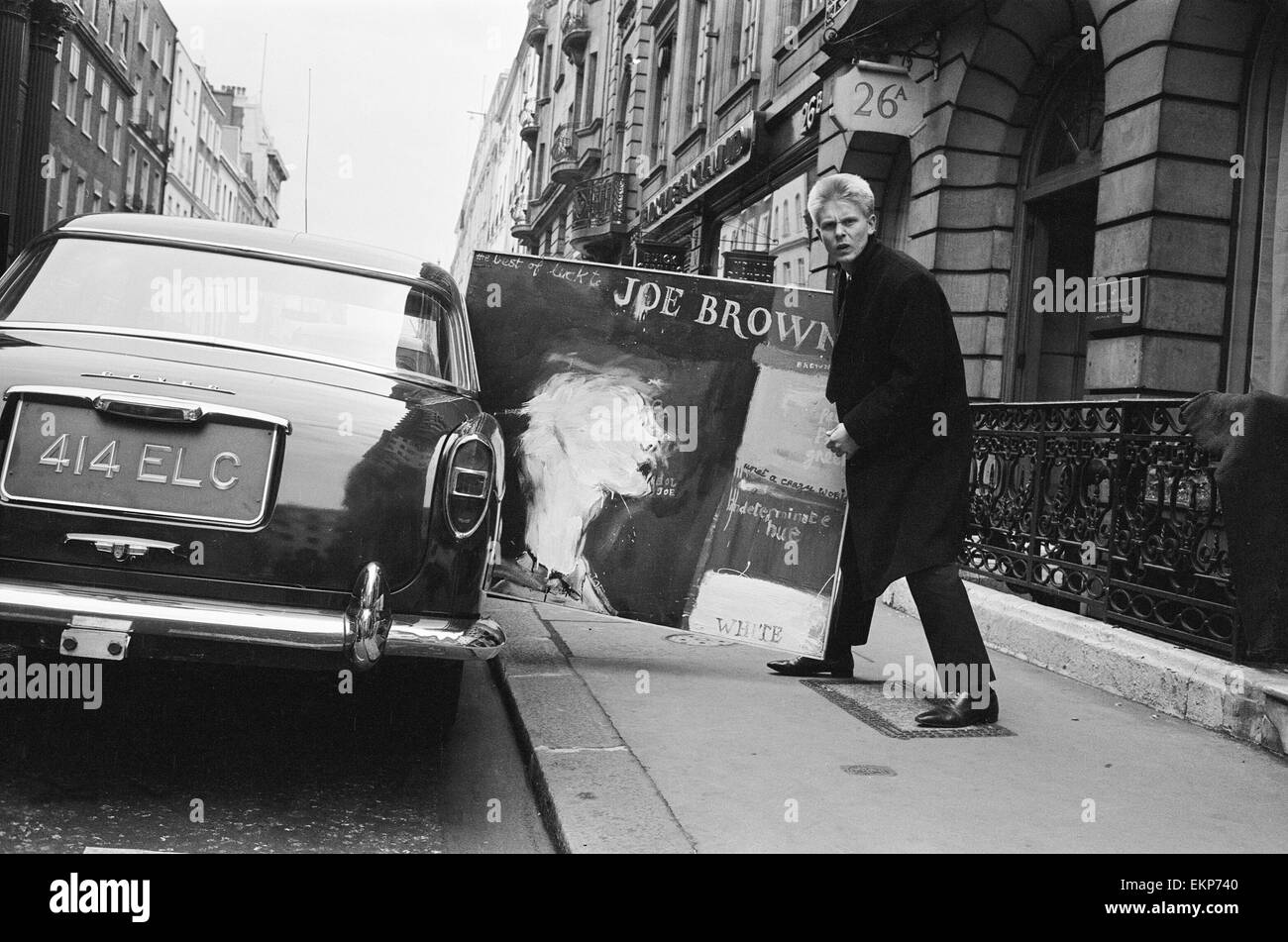 Singer Joe Brown collects a picture of himself from Portal Gallery, Grafton Street, W1. 5th July 1962. Stock Photo