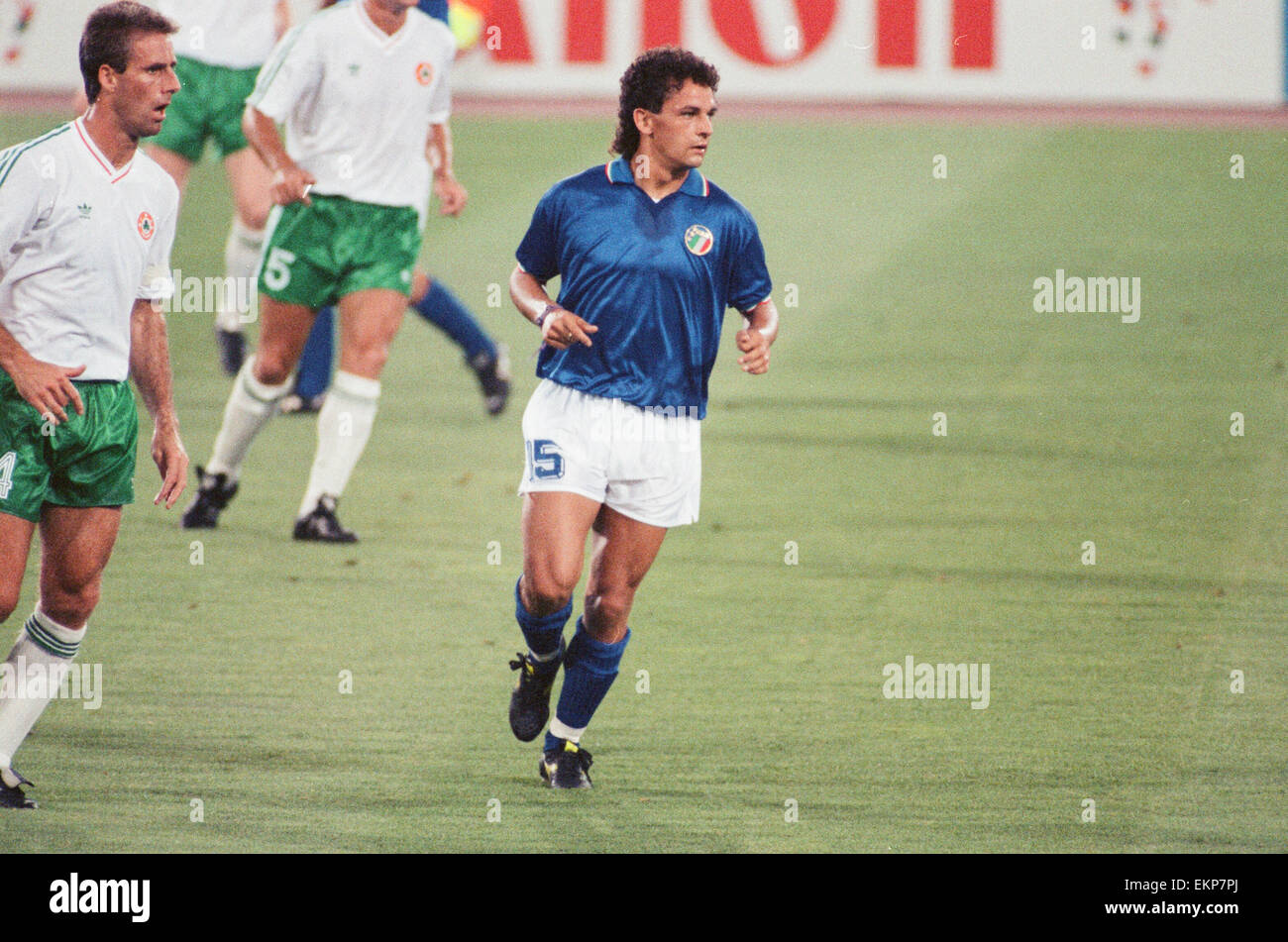 1990 World Cup Quarter Final match in Rome, Italy. Italy 1 v Republic of Ireland 0. Italy's Roberto Baggio watched by Mick McCarthy. 30th June 1990. Stock Photo