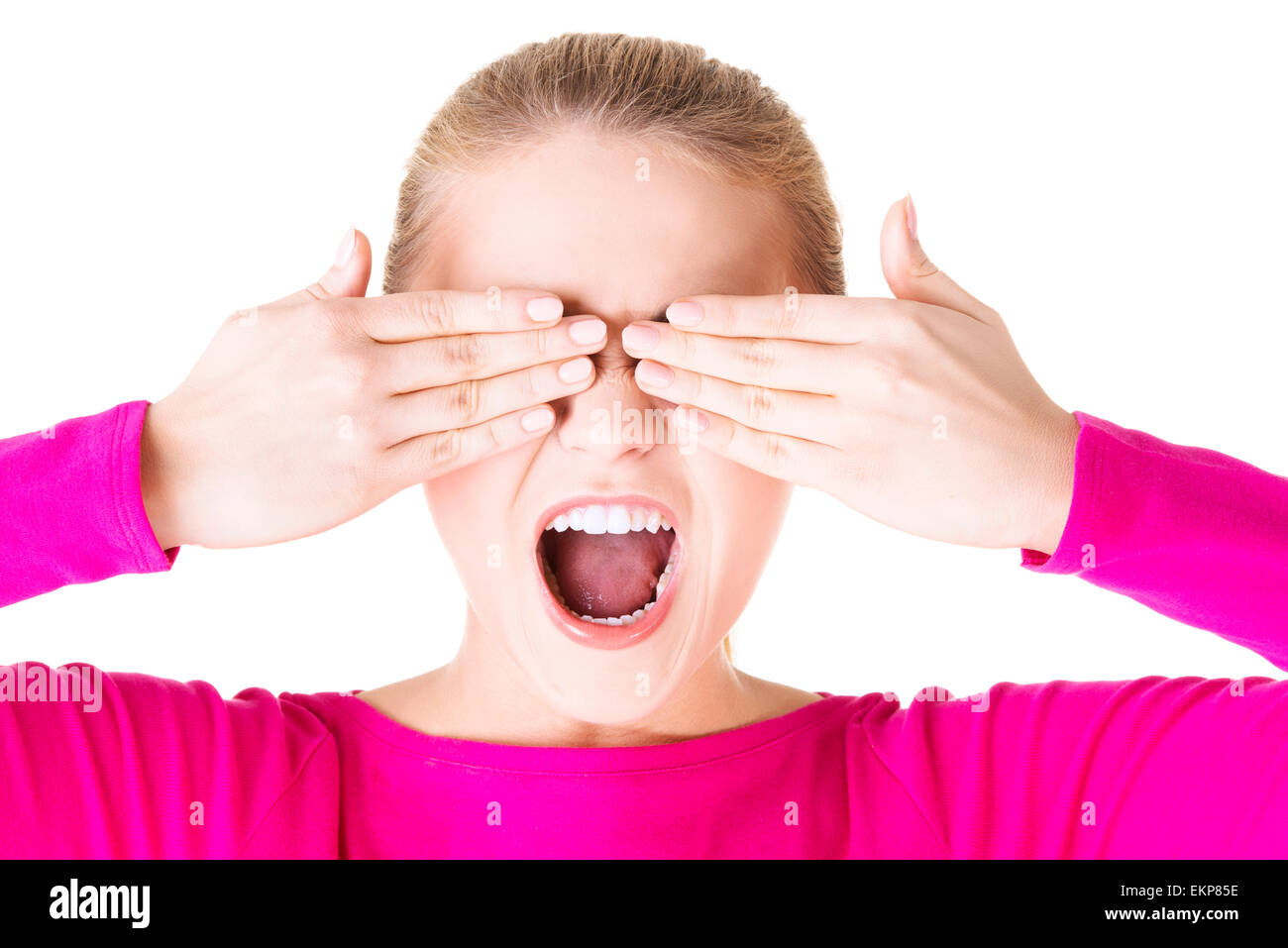 Young teen woman covering her face with hands Stock Photo - Alamy