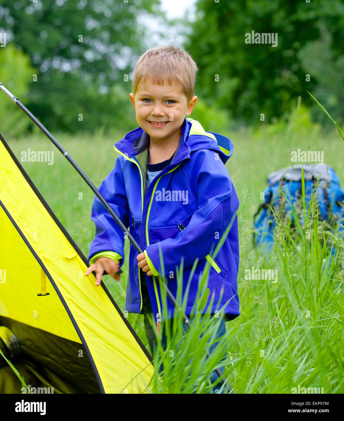 young boy camping with tent Stock Photo Alamy