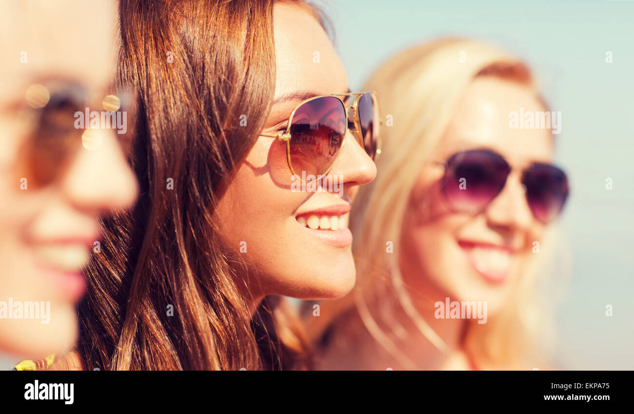 close up of smiling young women in sunglasses Stock Photo - Alamy
