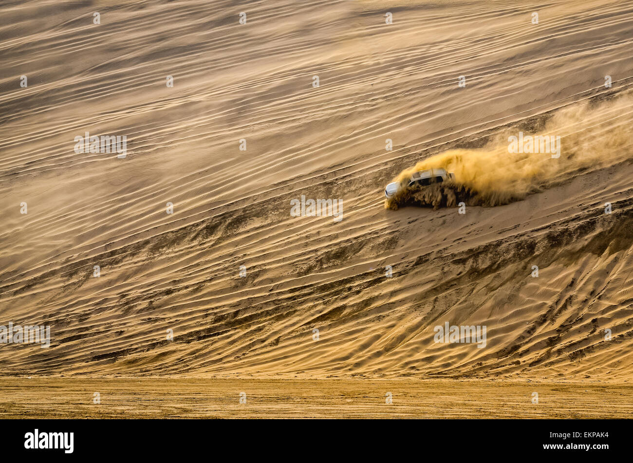 Offroad vehicle driving in the sand desert Stock Photo Alamy