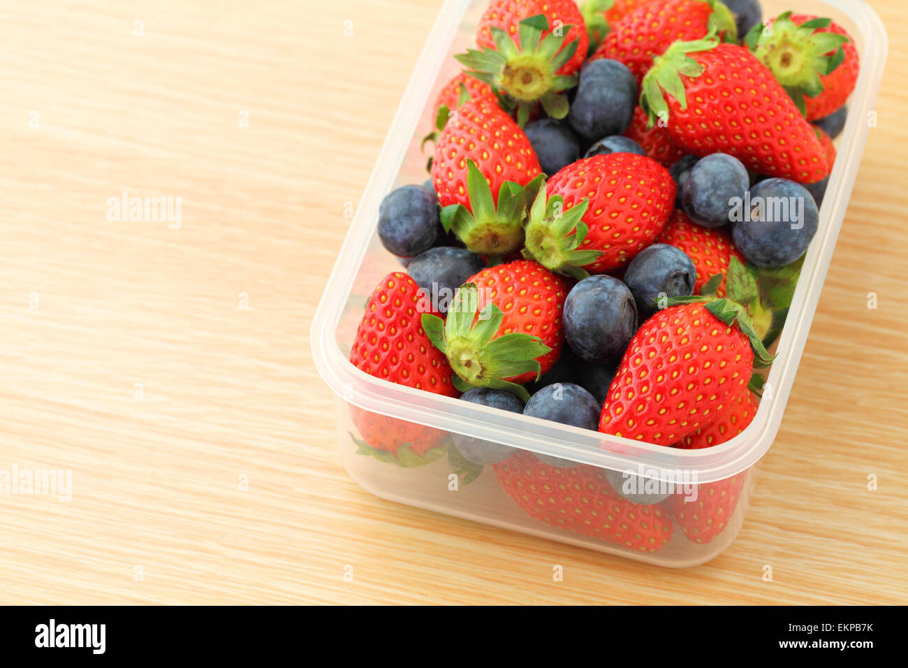 Strawberry and blueberry mix in plastic container Stock Photo Alamy